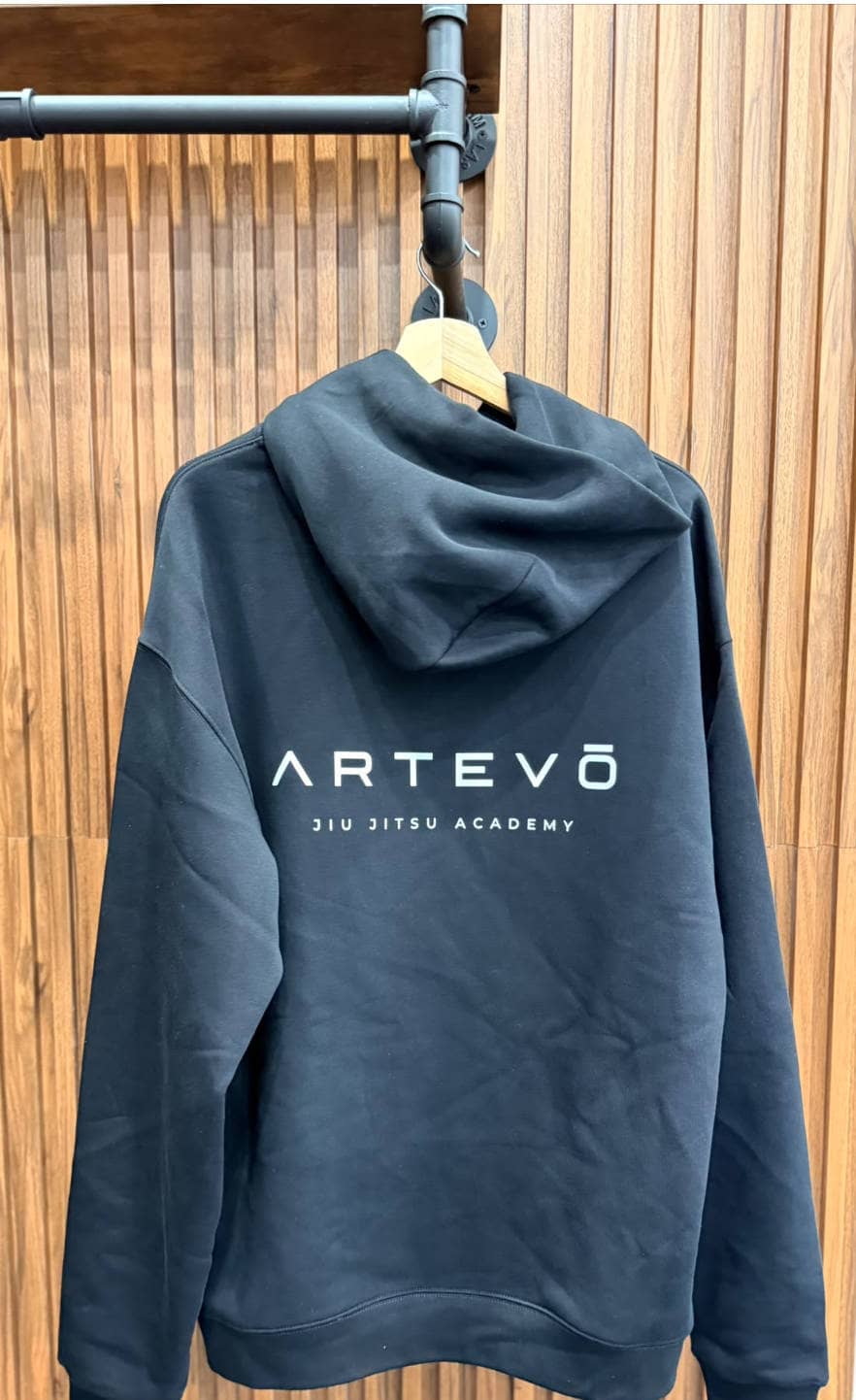 Artevō Jiu Jitsu Academy black hoodie, back view, showing Artevō wordmark logo