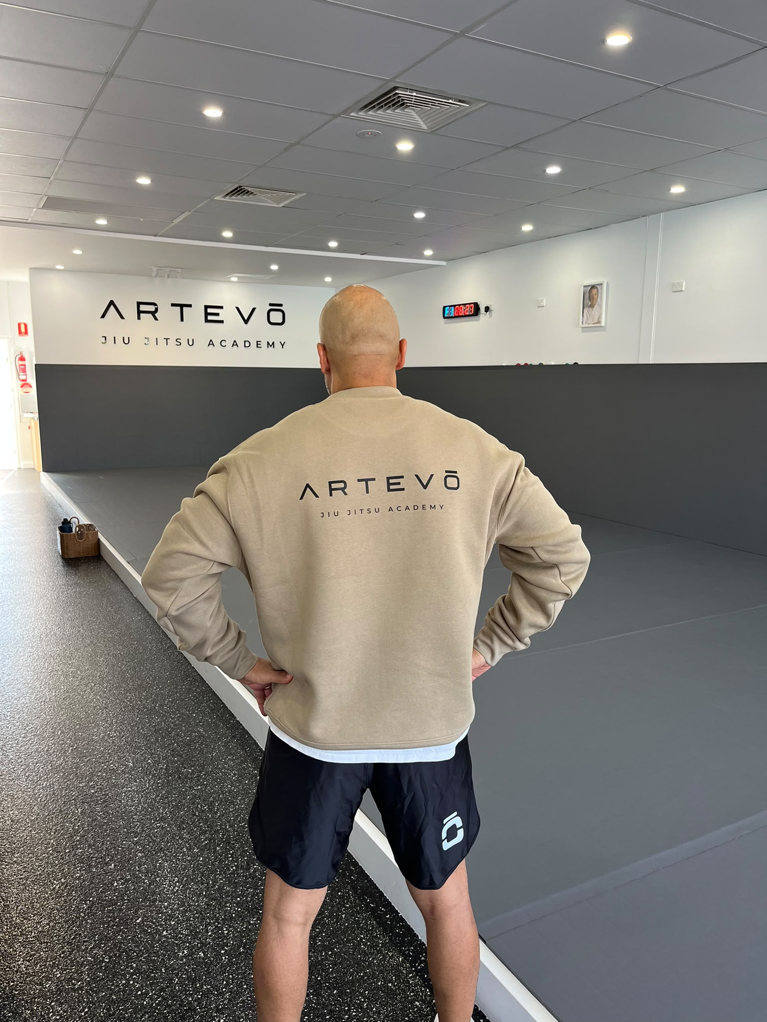 Artevō khaki crewneck jumper rear view worn by Mark.